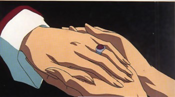 Shiori acaricia la mano de Juri